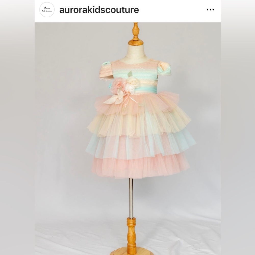 Beggi multicolor dress sold by Aurora kids couture.